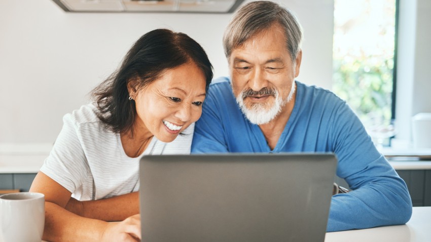 Couple looking at laptop computer