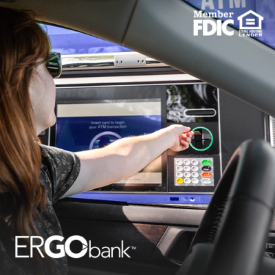 Woman inserting her card at an Ergo Bank ITM machine.